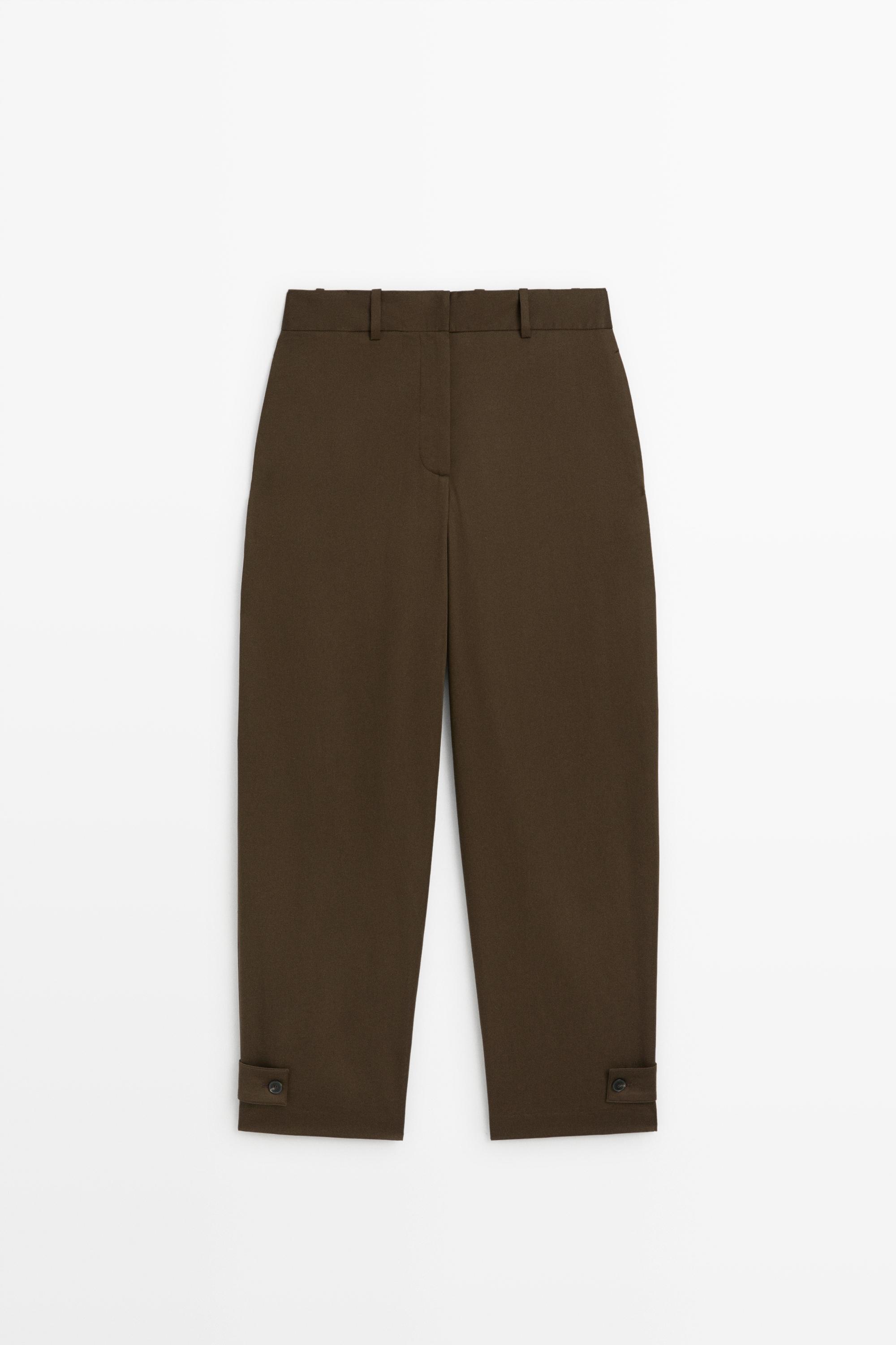 Pants with buttoned hem detail